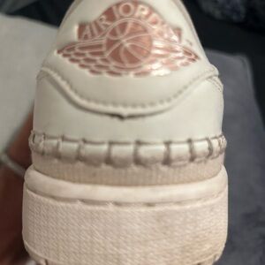 Nike Air Jordan White and Rose Gold Athletic Shoes